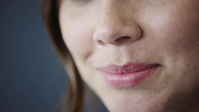 Woman, face or mouth with lips, teeth or invisible braces for healthcare wellness, dental hygiene maintenance or cosmetic treatment. Zoom, smile or happy model with tooth whitening success or texture