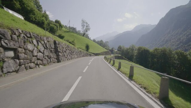 Driving video of the Sustenpass in Switzerland. The Susten pass is a famous alp road and has a scenic mountain panorama. View from the car. Experience calming nature and exciting pass roads.