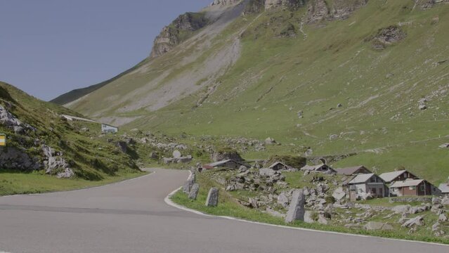 Driving video of the Sustenpass in Switzerland. The Susten pass is a famous alp road and has a scenic mountain panorama. View from the car. Experience calming nature and exciting pass roads.