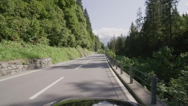 Driving video of the Sustenpass in Switzerland. The Susten pass is a famous alp road and has a scenic mountain panorama. View from the car. Experience calming nature and exciting pass roads.