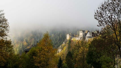 wafts of fog in the mountains of Austria