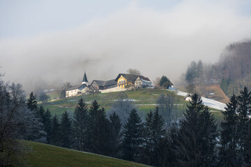 wafts of fog in the mountains of Austria