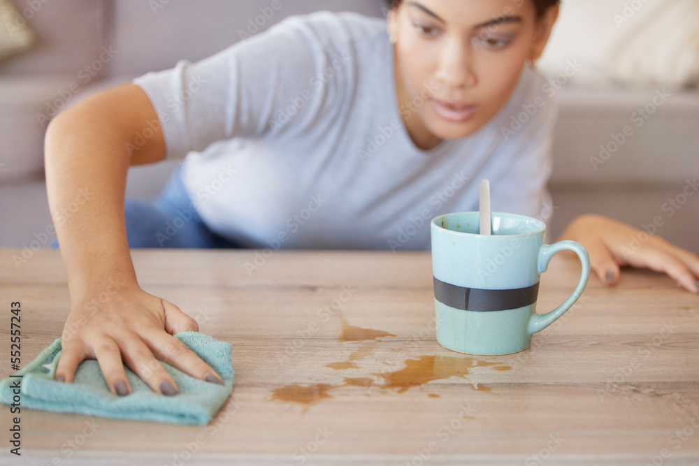 Sticker Cleaning surface, coffee spill and woman wipe furniture, coffee table and counter in living room with cloth. Housekeeping, hygiene and young woman with rag for liquid mess, dirt and stain from tea