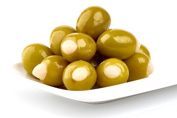 Garlic Stuffed Green Olives on white plate, isolated on white background.