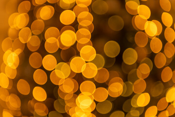 abstract blurred background. bokeh background with no people. blurred gold color background.