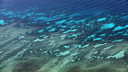 Airview of shallow water-covered Michaelmas Reef on the Great Barrier Reef. Queensland-Australia-319