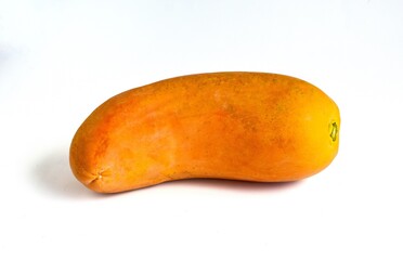 Yellow sweet ripe papaya isolated on white background.