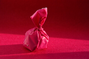 chocolates. sweets. background for the design. viva magenta