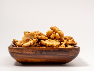 Walnut on a white background. Raw walnut.