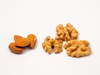 Almond and walnut on a white background. Raw nuts.