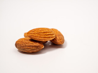 Almond on a white background. Raw almond.