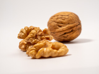 Walnut on a white background. Raw walnut.