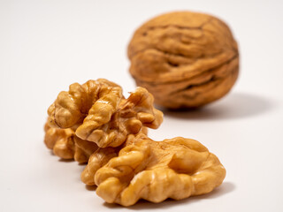Walnut on a white background. Raw walnut.