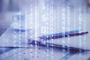 Double exposure of table with computer on background and data theme hologram. Data technology concept.