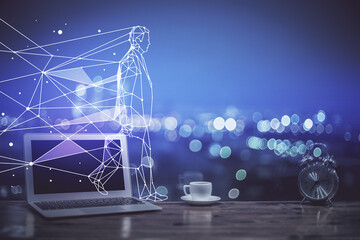 Desktop computer background in office and start up theme hologram drawing. Double exposure. Startup concept.