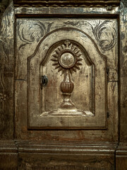 Antique wooden tabernacle golden color front view