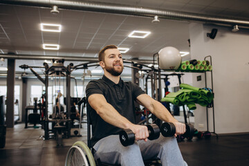 Person who uses a wheelchair training in the gym. Rehabilitation center