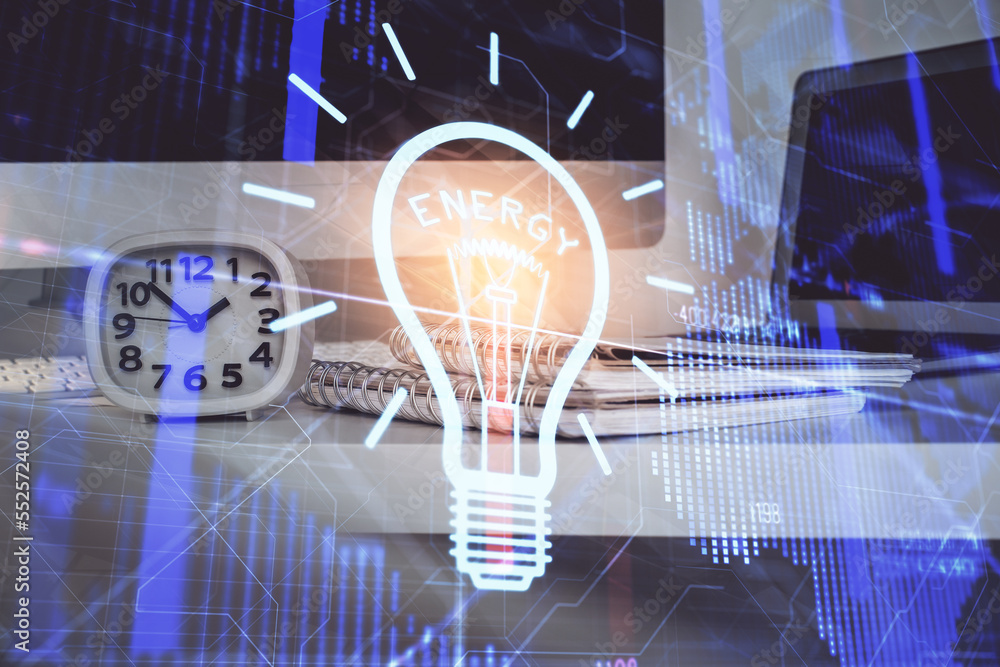 Poster Computer on desktop in office with bulb icon hologram. Multi exposure. Concept of idea.