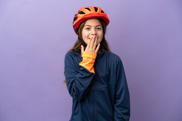 Little caucasian girl isolated on purple background happy and smiling covering mouth with hand