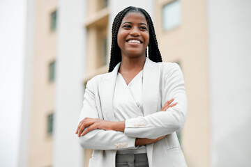 Arms crossed, happy vision and black woman with power, business and motivation for corporate...