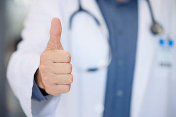 Winner, success and doctor thumbs up at hospital for agreement, achievement or thank you....