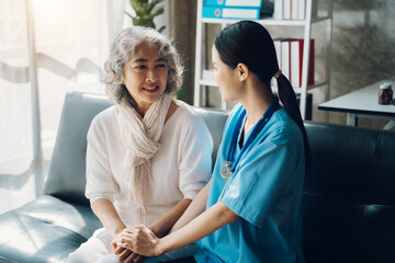 Asian doctor women and patient discussing while sitting. Medicine and health care concept.