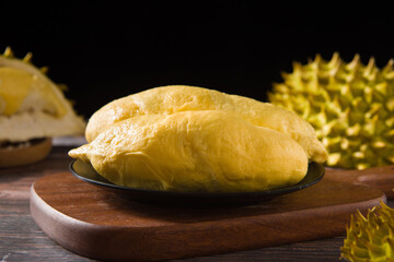 Durian riped and fresh ,durian peel on wooden table.
