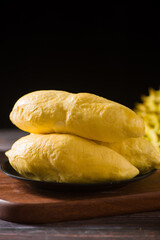Durian riped and fresh ,durian peel on wooden table.