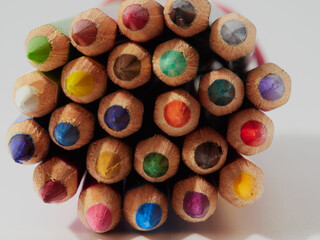 Colored pencils isolated on a white background. Close it.