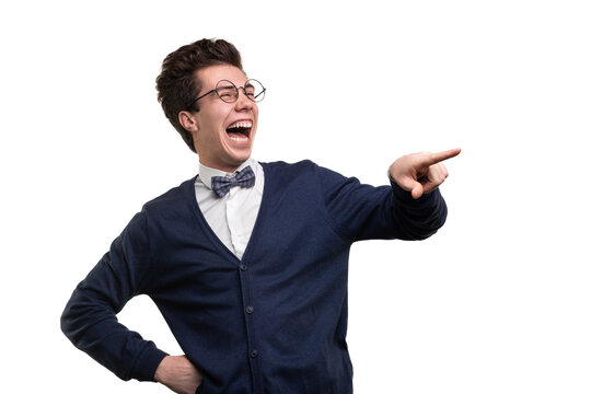 Young male nerd pointing away and laughing