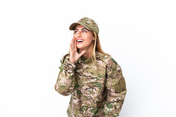 Military woman isolated on white background shouting with mouth wide open to the lateral