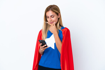 Super Hero caucasian woman isolated background thinking and sending a message