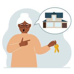 A old woman holds the keys to the house, and in his thoughts a beautiful house. The concept of buying, renting, selling real estate.