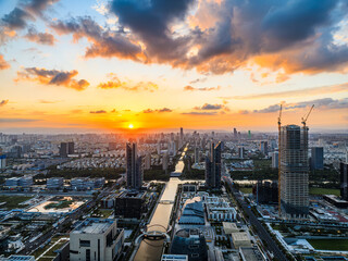 Aerial view of city skyline and modern buildings at sunrise in Ningbo, Zhejiang Province, China. 