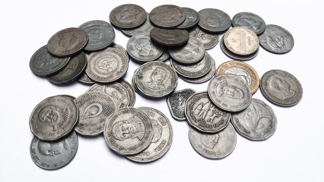 Old coins on white background, rare coins