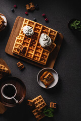 photography of a wooden cutting board topped with waffles on top of a table - Christmas - AI Generated