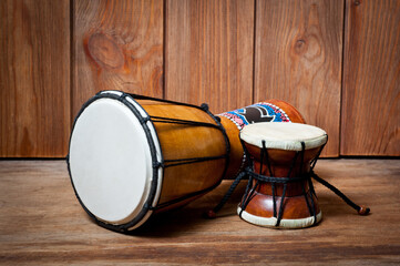 Damaru and djembe drums, percussion and musical instruments.