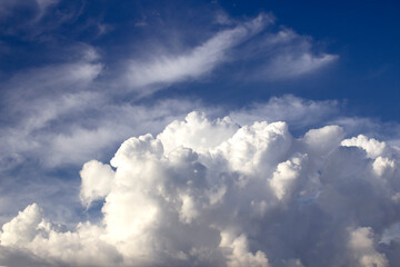 Naklejka na ściany i meble white clouds with sunlight on blue sky background