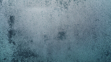 Condensation on window glass in frosty winter weather. Background in the form of small drops on the glass. - obrazy, fototapety, plakaty