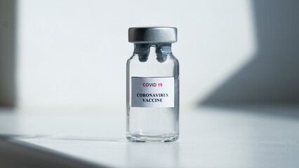 Empty ampoule without logo. Cosmetic preparation. Medicine. Vaccination against COVID-19