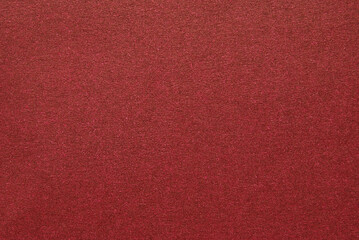 Burgundy color craft paper texture or background