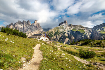 Beautiful Morning at Tre Cime di Lavaredo Mountains with blue sky, Dolomites Alps, Italy
