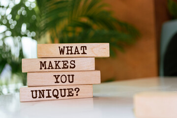 Wooden blocks with words 'What Makes You Unique?'.