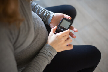 Pregnant Woman Self Monitoring glucose