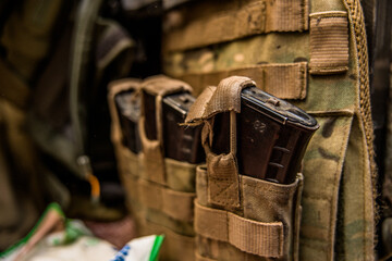 a handful of bullets in the hands of a soldier. bullet shop