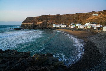 Puertito de los Molinos, a small fishermen village on the west coast of Fuerteventura island in the Canaries - Hamlet of traditional houses built in a bay protected by sea cliffs by the Atlantic Ocean