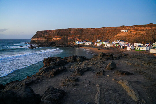Puertito de los Molinos, a small fishermen village on the west coast of Fuerteventura island in the Canaries - Hamlet of traditional houses built in a bay protected by sea cliffs by the Atlantic Ocean
