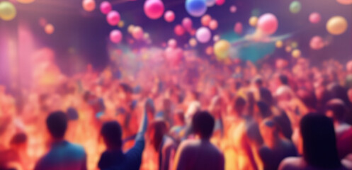 Fototapeta premium Blurred background revelry shindig. A balloon party with people are having fun in colorful spotlight at a nightclub 