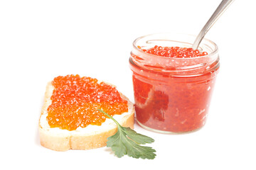 Glass jar delicious red caviar sandwich with red caviar isolated on white background.