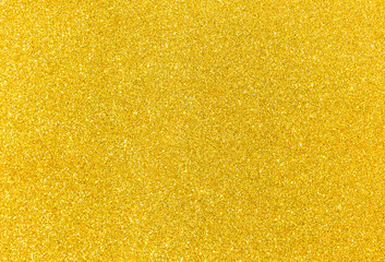 Abstract blurred gold glitter background, shiny golden texture background, Christmas and New year...